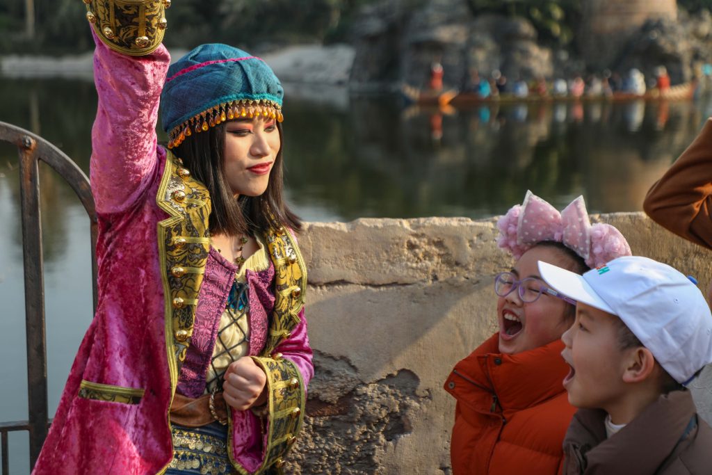 Wish kid interacts with characters at Shanghai Disney