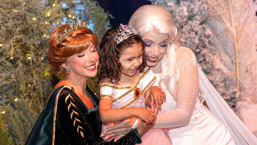 Make-a-Wish kid with Frozen characters