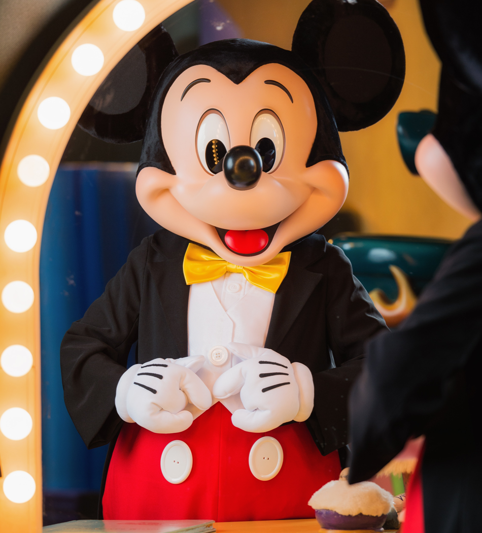 Mickey mouse in front of a mirror