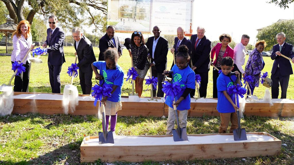 Senior Vice President of Walt Disney World Communications and Public Affairs Rena Langley joins leaders from Boys & Girls Club of Central Florida, elected officials and three children as they perform an official groundbreaking ceremony using shovels.