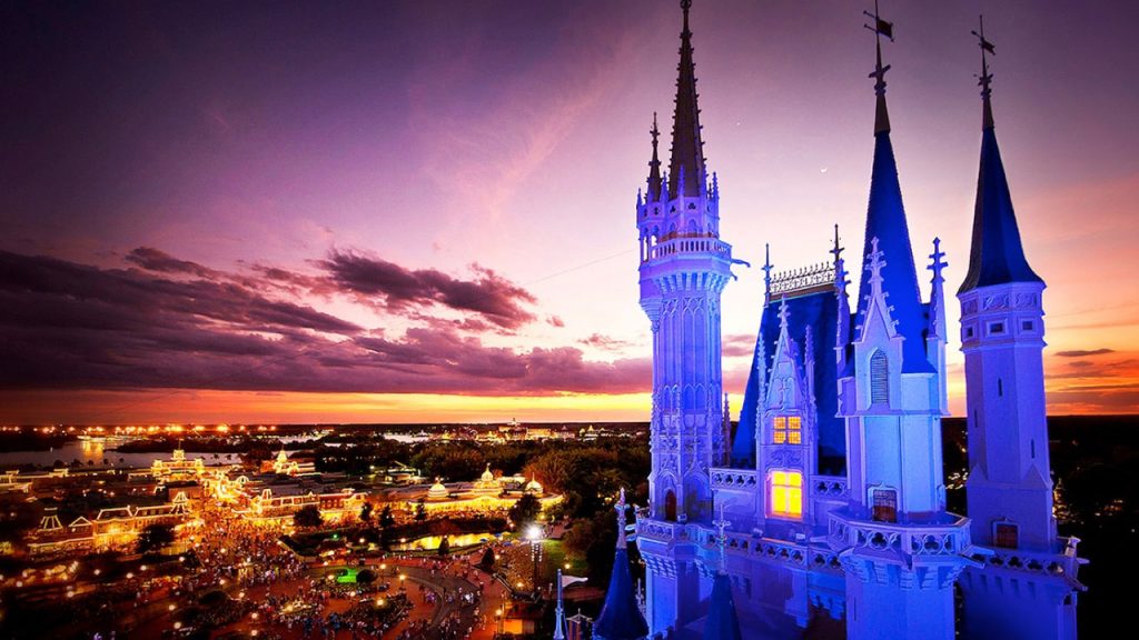 Aerial night view of Cinderella Castle and Magic Kingdom
