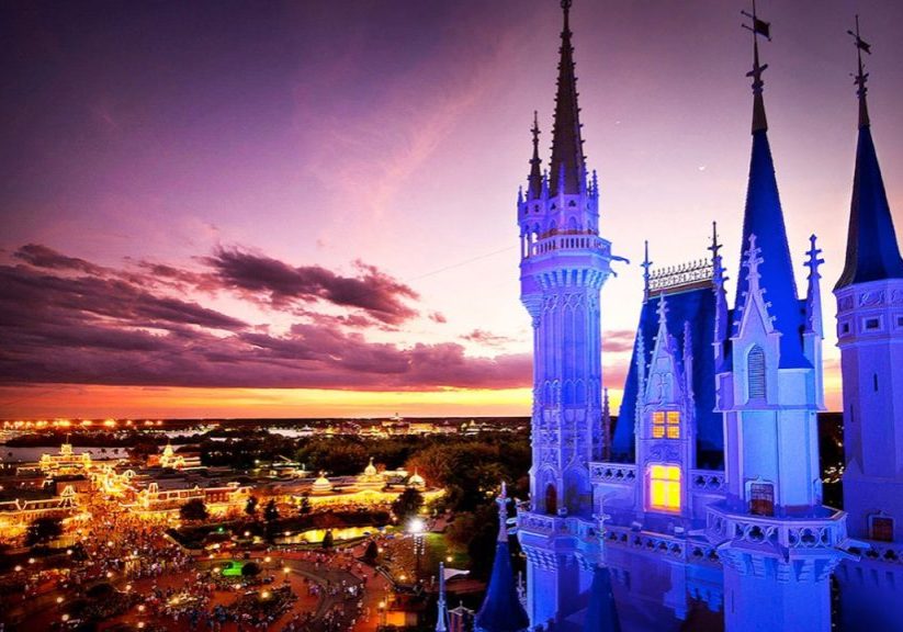 Aerial night view of Cinderella Castle and Magic Kingdom