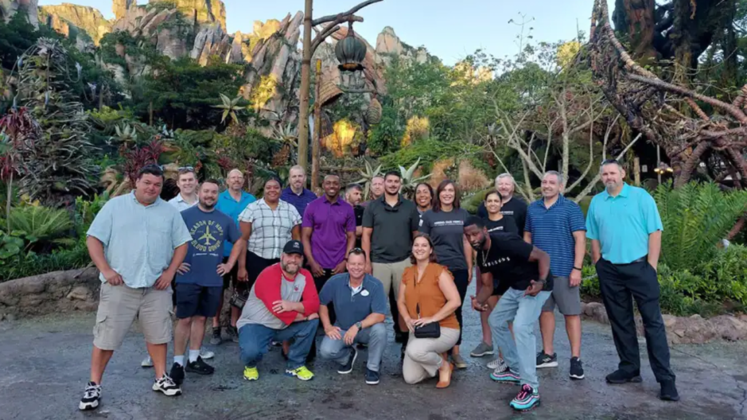 Veterans post for a group photo in the land of Pandora after a special backstage tour.