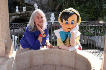 Debby and Pinocchio at the wishing well.