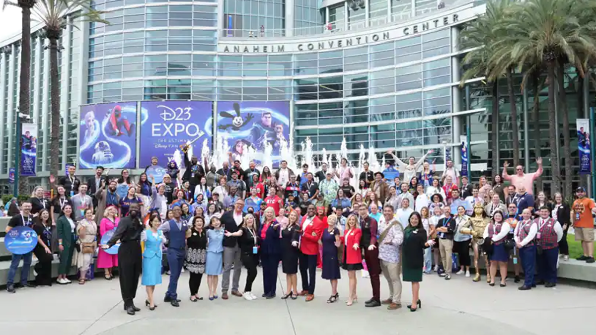 Cast Members gather for a photo at D23 Expo
