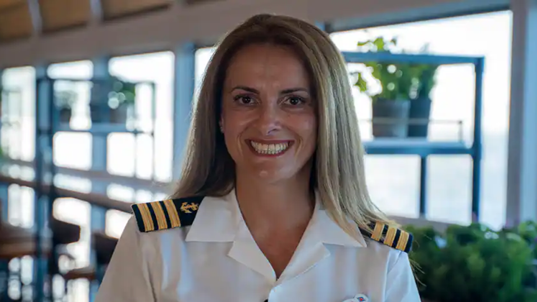 Catalina smiling in her uniform.