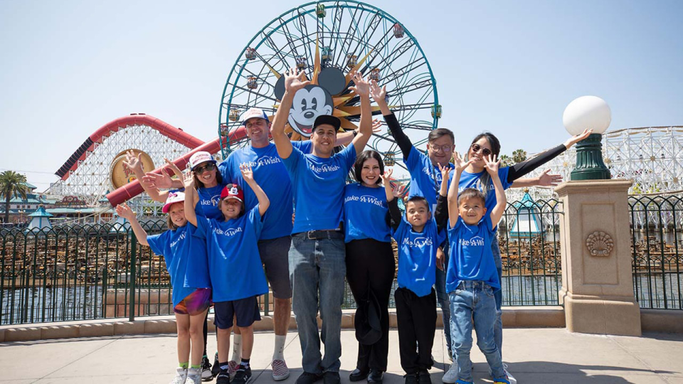 Wish Family poses for a photo at Disney's California Adventure's Paradise Pier