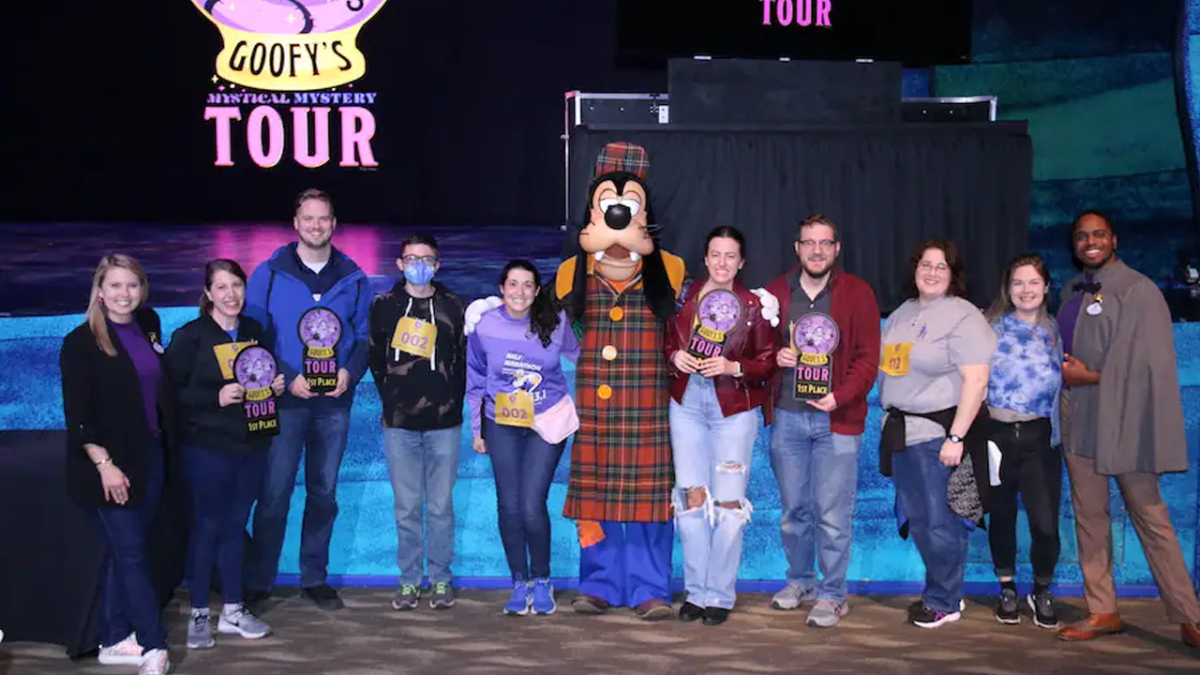 Goofy's Mystery Tour Winners onstage with Goofy and the Ambassadors