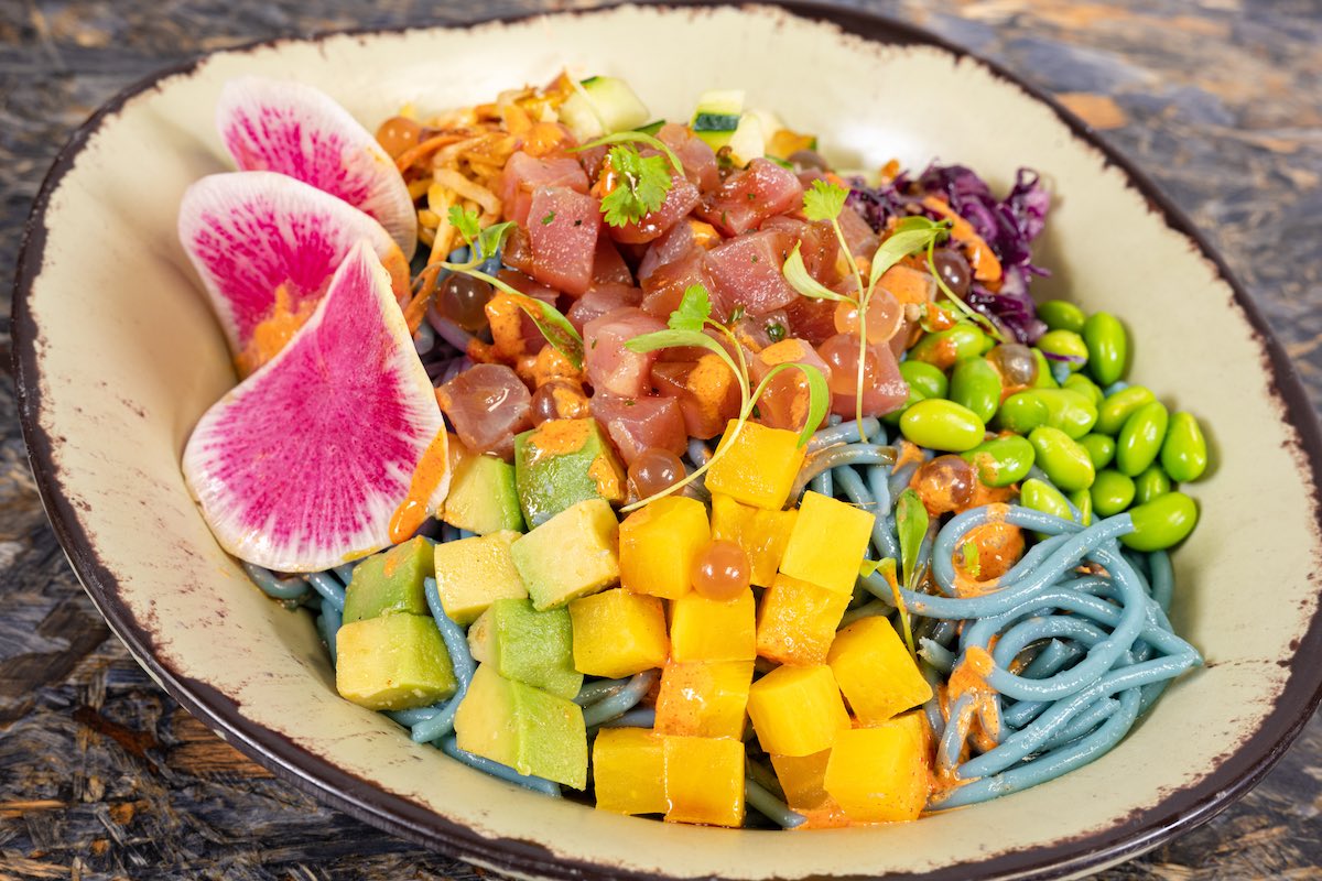 Ocean Moon Bowl, a salad dish featuring blue noodles with veggies, available at Satuli Canteen