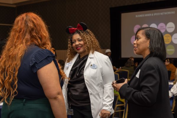 women RICE attendees network with one another at the event