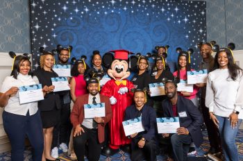 attendees at RICE celebrate graduation with Mickey Mouse