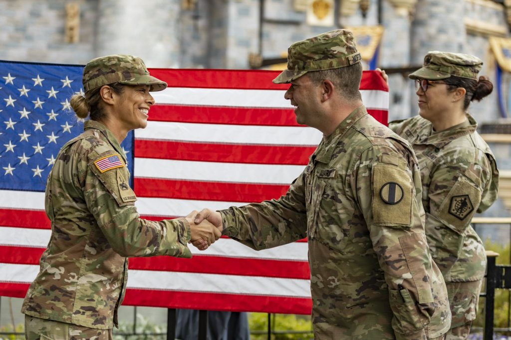 US Army colleagues congratulating each other
