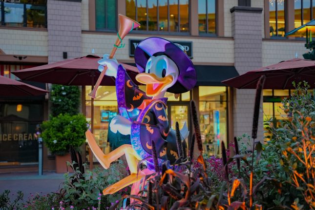 Donald Duck smiles while celebrating the Halloween season at the Downtown Disney District.