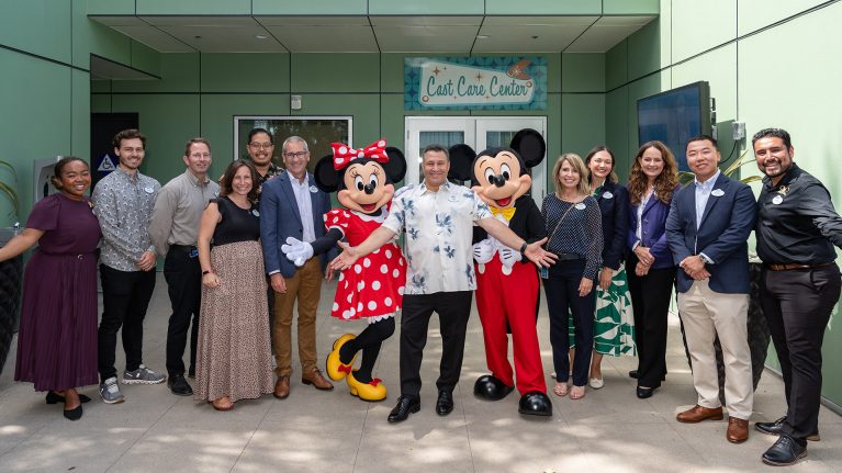 Mickey Minnie and a group of cast members