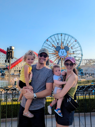 The McConnell family in front of Pixar Pal-A-Round.