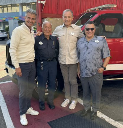 Bob Iger CEO of The Walt Disney Company, Josh D’Amaro Chairman of Disney Experiences, Ken Potrock President of Disneyland Resort surprise Hank at Disneyland on October 8, his official 62nd service anniversary.  