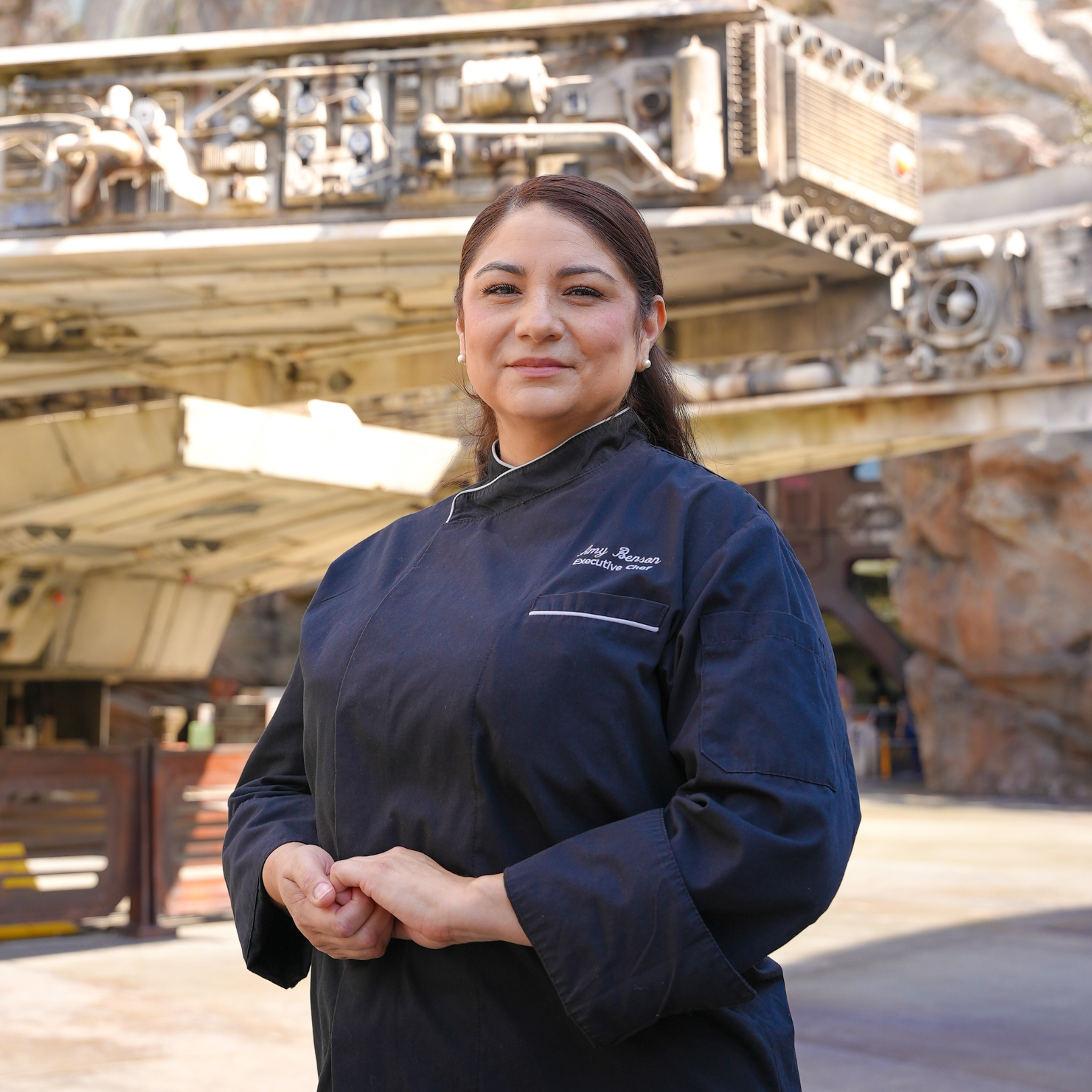 Chef Amy Benson poses in Star Wars: Galaxy's Edge at Disneyland Park