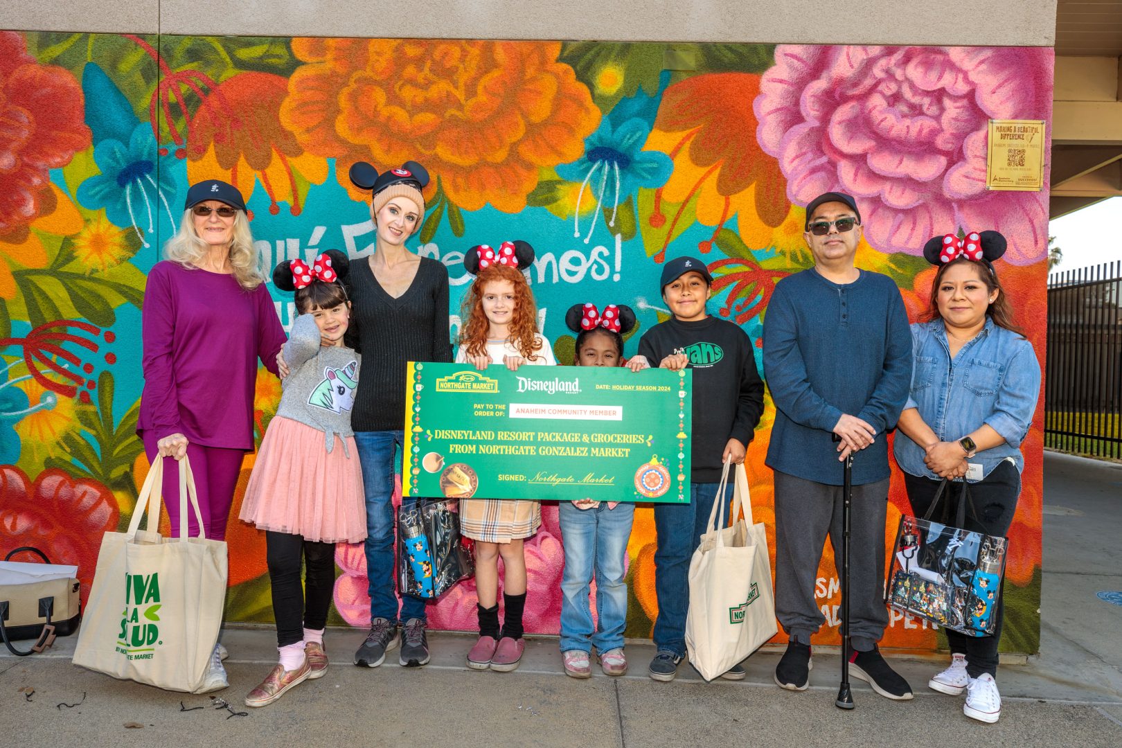 Community representatives from the Boys & Girls Club of Anaheim, the Anaheim Independencia Family Resource Center and Chrysalis Anaheim collect donation from Northgate González Market.