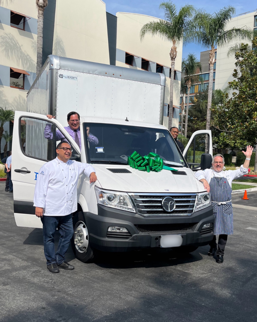 Disneyland Resort cast members celebrate an updated zero-emission vehicle for their teams to use.