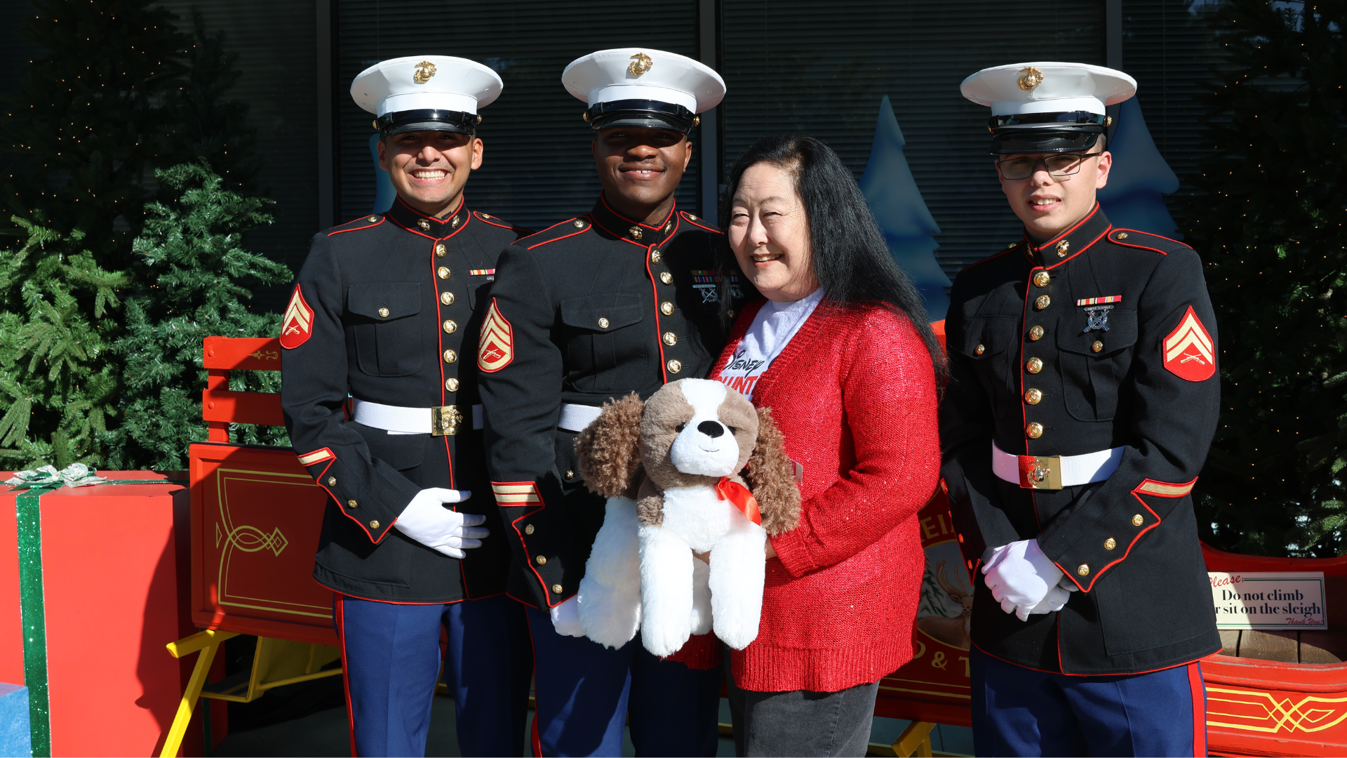 Vicki with Marines supporting Toys for Tots at a pop-up shop hosted at Disneyland Resort.