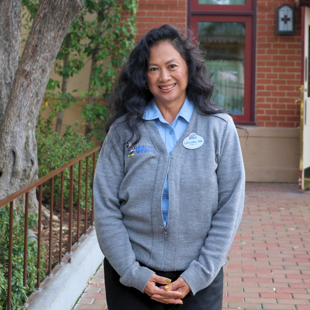 Disneyland Resort nurse Leilani pictured in front of Disneyland Resort First Aid.