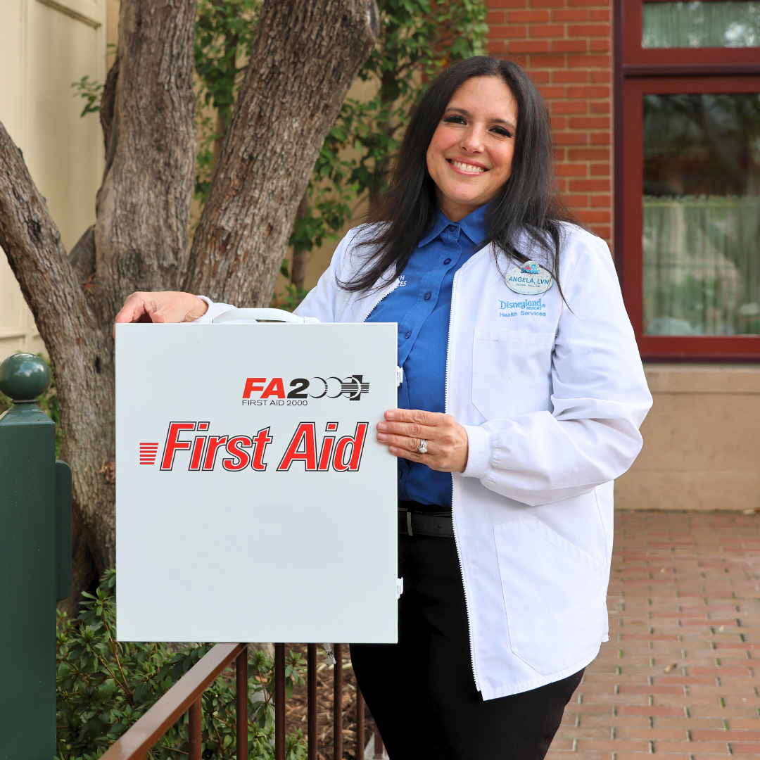 Disneyland Resort nurse Angela stands in front of First Aid.