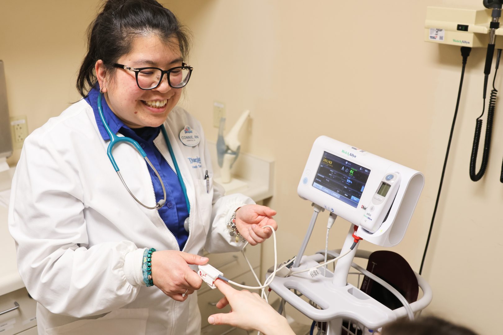 Disneyland Resort nurse Connie checks vitals.