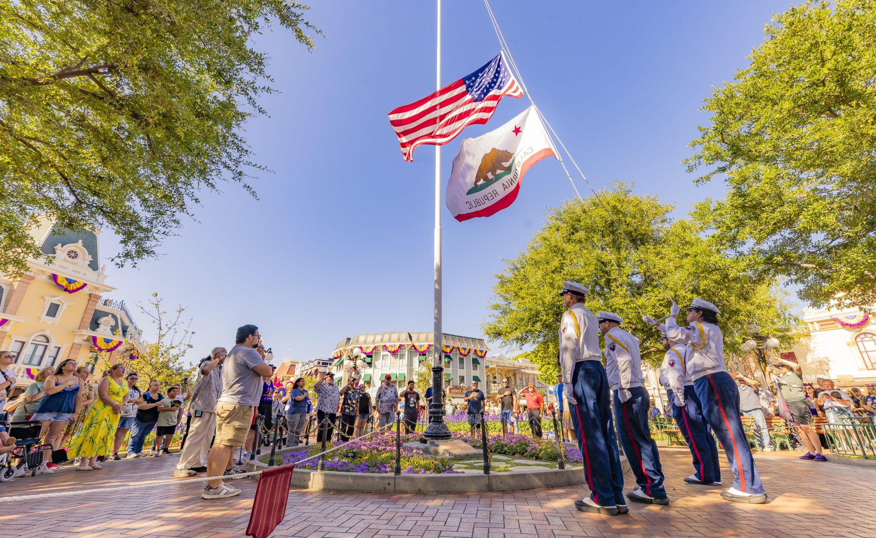 U.S. Marines and Sailors participate in the flag retreat ceremony at Disneyland Resort.